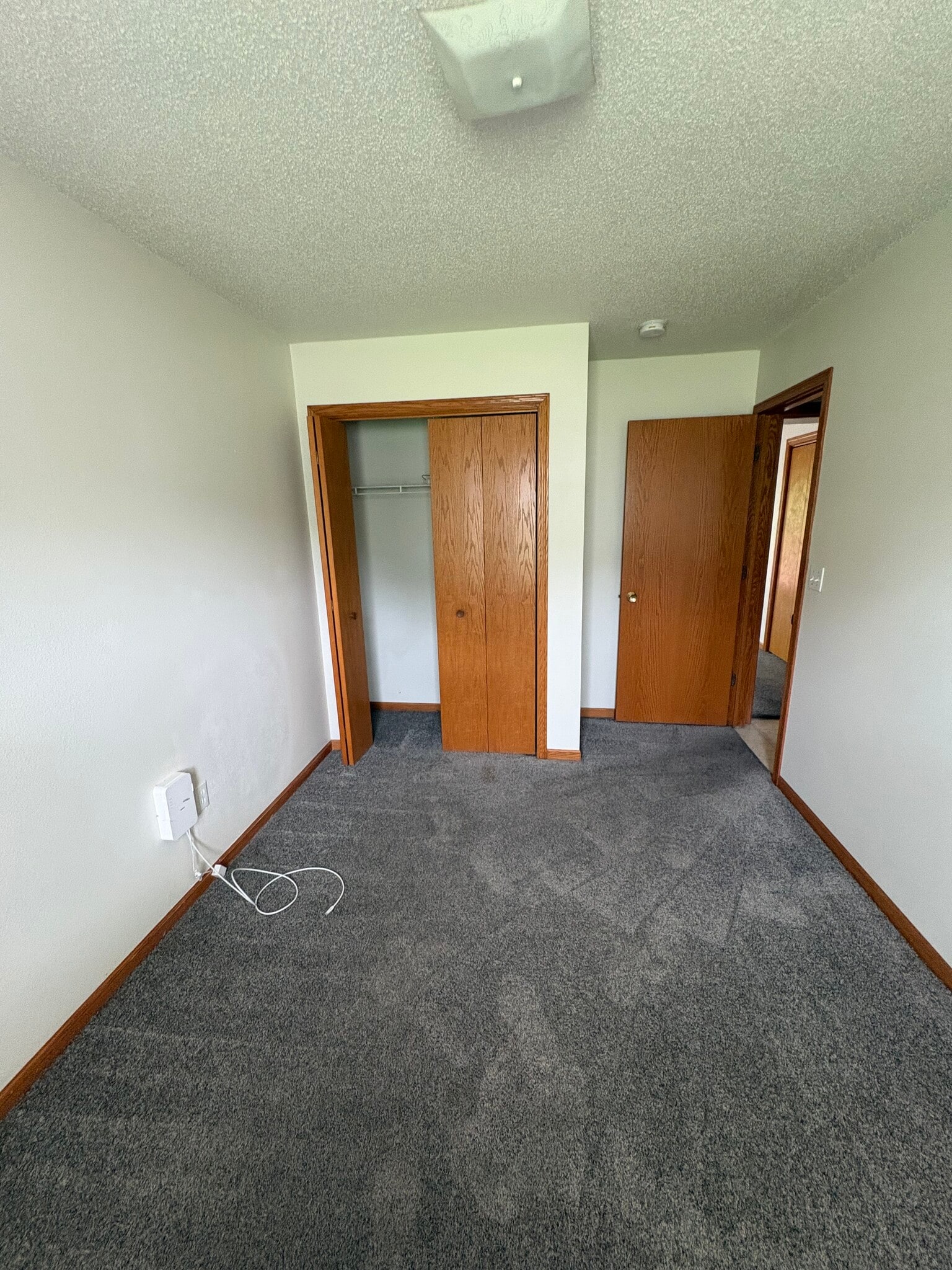 Downstairs bedroom double closet - 2117 14th St