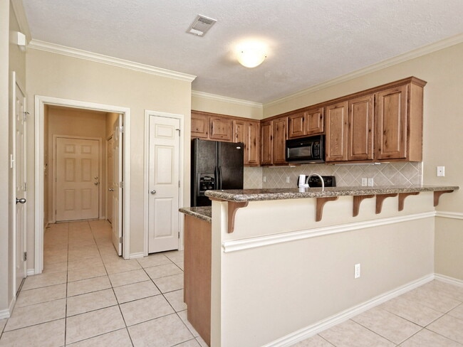 Building Photo - "Spacious 4-Bed, 4-Bath Townhouse Gem in College Station – Perfect for Comfortable Living!"