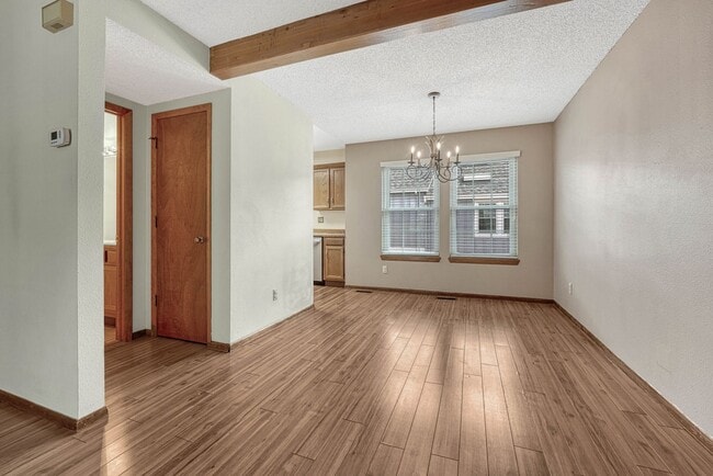 Building Photo - Move-In Ready Townhome with Garage & Great Amenities!