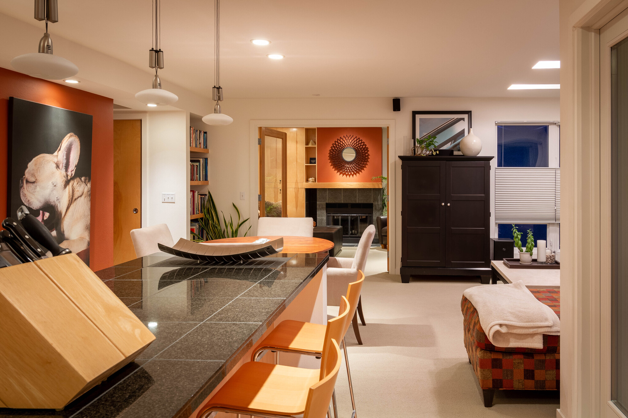 Kitchen is open concept with spacious island with counter seating and located adjacent to deck - 535 Summit Ave E