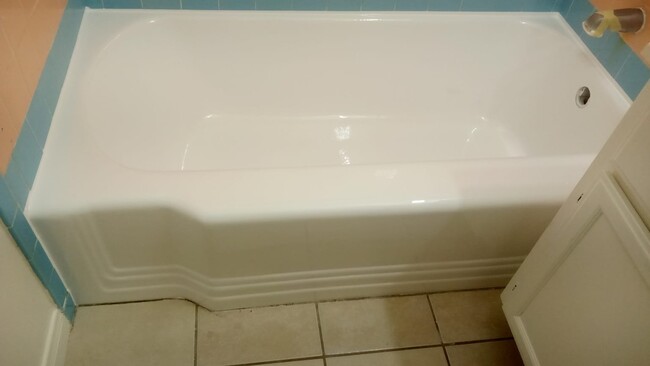 Shiny newly resurfaced tub - 5622 Kinston Ave