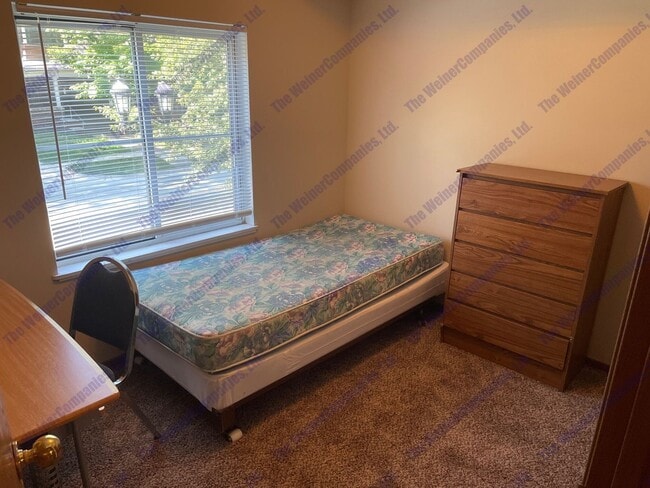 Building Photo - Furnished 4-Bedroom, 2-Bath Condo on Campus