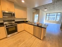 Building Photo - Advent - Gorgeous & Bright Contemporary Style Condo W/ Parking & Laundry!