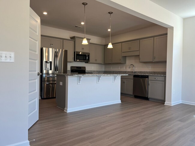 Building Photo - Beautiful Newly Constructed 3/.25 Townhome!