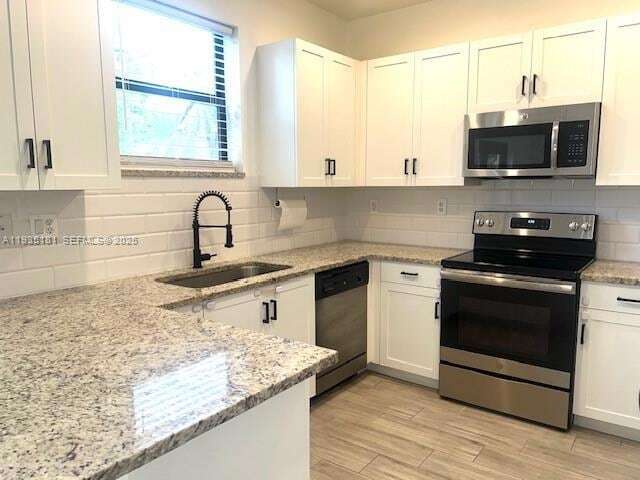 Building Photo - 5505 NW 27th Ct