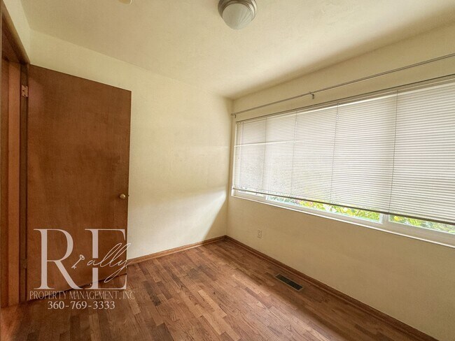 Building Photo - Enjoy Breathtaking Sunsets in the Heart of...