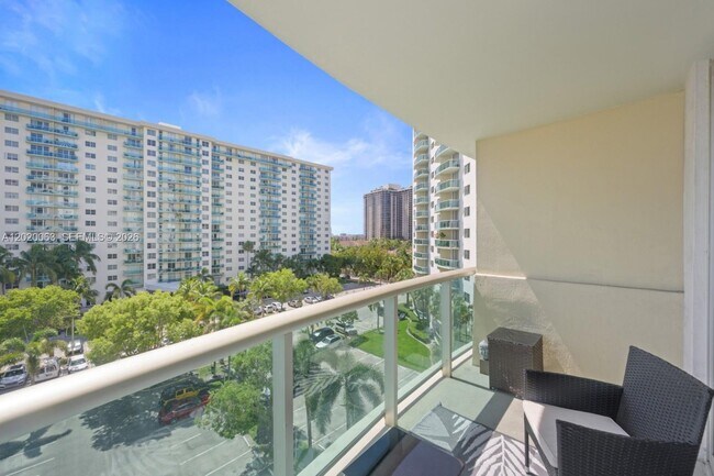 Building Photo - 19380 Collins Ave