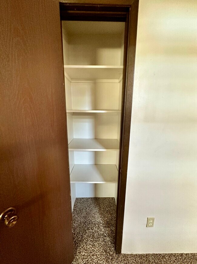 Lower level linen closest - 13409 E 8th Ave