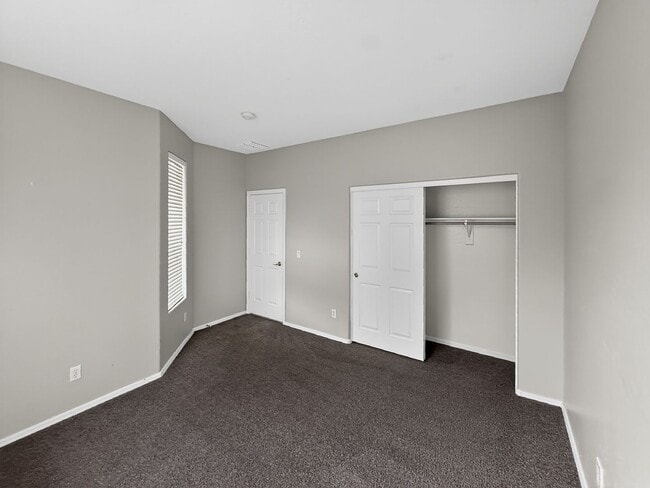 Building Photo - Single-level 4 bed, 2 bath home with tandem 3-car garage and RV gate.