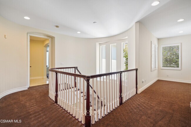 Building Photo - 6077 Mandeville Pl