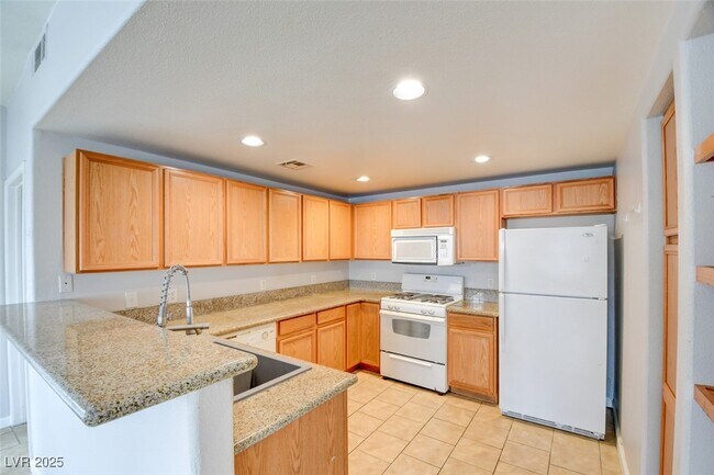 Building Photo - 9580 W Reno Ave