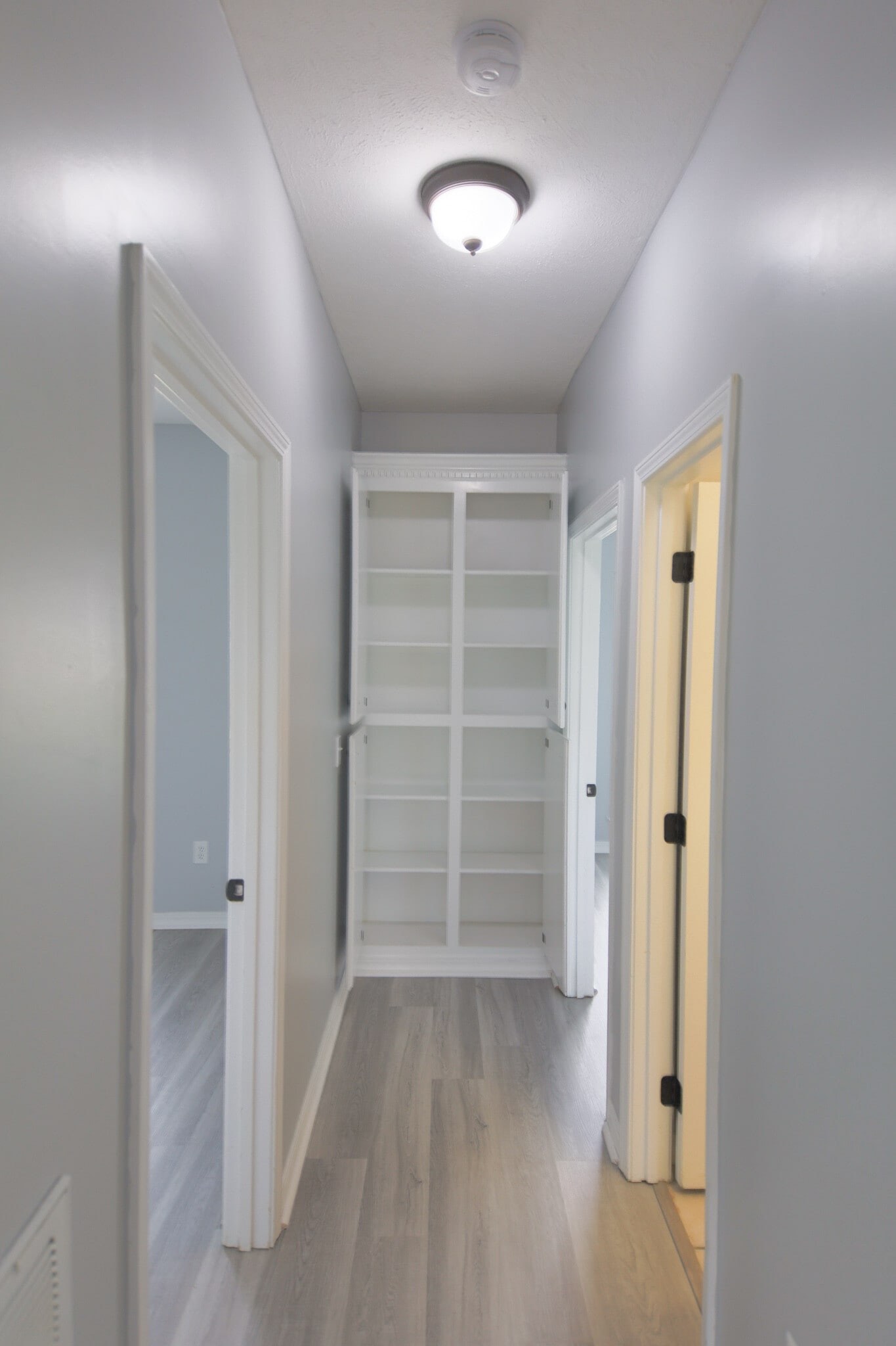 Hallway to Guest Bathroom and Bedrooms 2 and 3 - 106 Hanover Cove