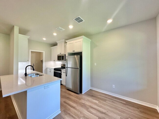 Building Photo - Tour Today! New Construction 4 Bed 2 Bath Triplex!