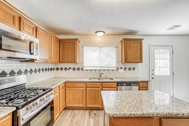 Building Photo - 6935 Moss Boulder Dr