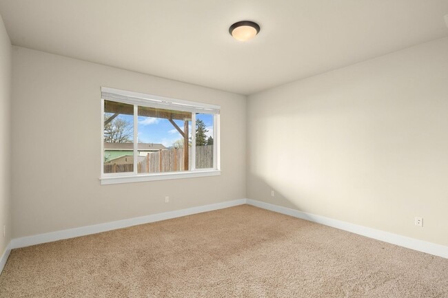 Building Photo - Water Views| Expansive Deck | Flexible Living Spaces