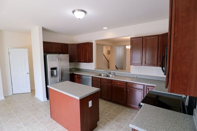 Building Photo - **Move-In Special** - Spacious 4BR Home wi...