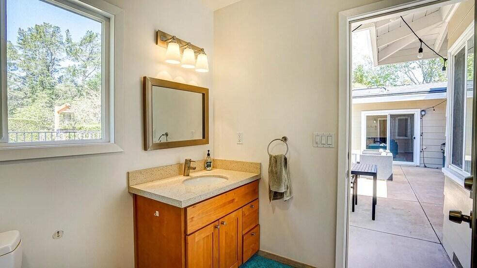 Bathroom #2 access to outside to use as a pool bath. Also access from childs bedrooms - 1415 Butterfield Rd
