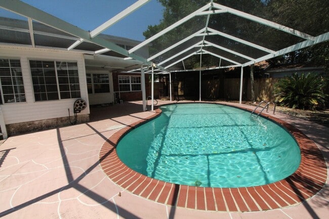 Building Photo - Pool Home with Office, Two Primary Suites ...