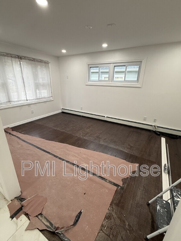 Building Photo - 115 8th Ave