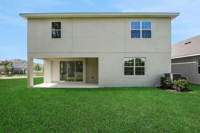 Building Photo - "Spacious 4-Bedroom Gem with 3 Full Baths in Charming Winter Garden!"