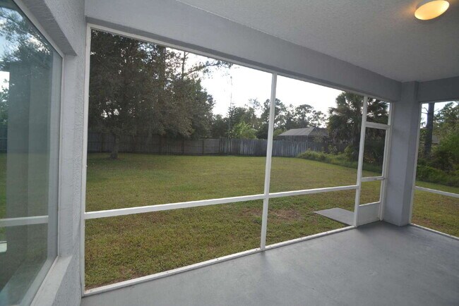 Building Photo - "Charming 3-Bed Oasis in Palm Coast - 1,85...