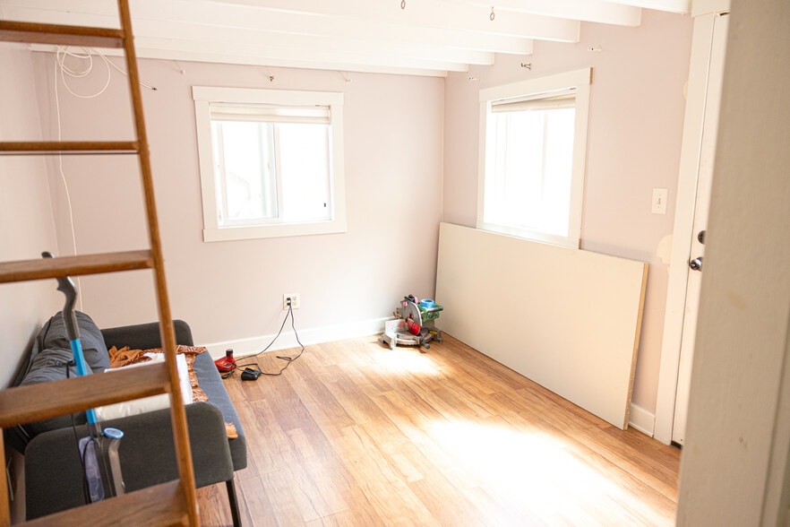 living area (nothing painted yet, new doors have been hung - 1359 Oakwood Dr