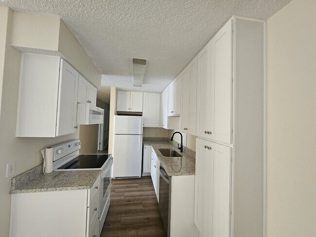 Building Photo - "Charming 2-Bed, 2-Bath Condo with Granite Elegance in Cantonment!"