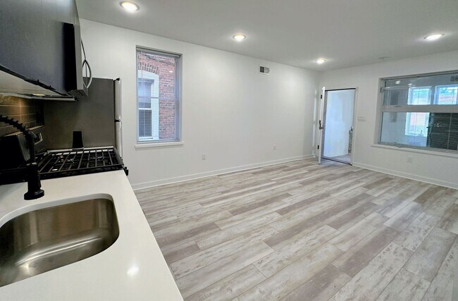 Building Photo - Renovated 2BR/2BA w/ Private Yard, Porch & In-Unit Laundry