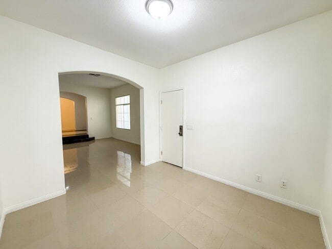 Building Photo - SPACIOUS HOME IN GATED COMMUNITY WITH POOL, RV PARKING & 4-CAR GARAGE!