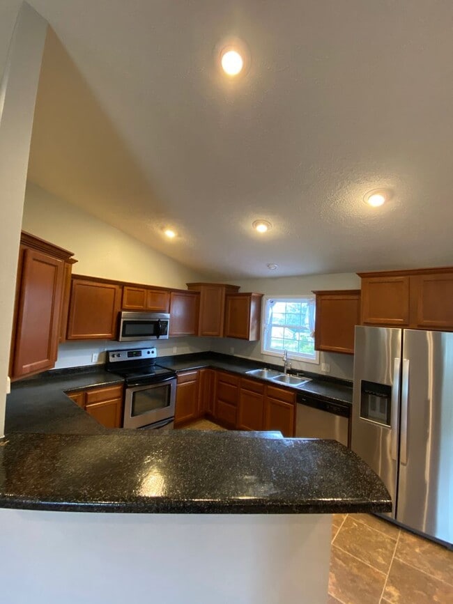 Building Photo - Updated, 4 Bedroom, Split Level Home