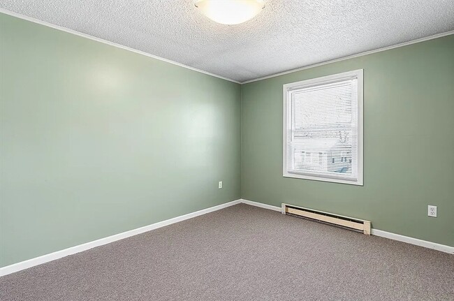 Building Photo - Spacious Layouts with Natural Light