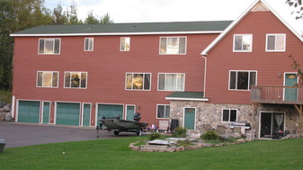 Garages for units 1,2 & 3  & front entry to unit #4 - 5185 Samuelson Rd