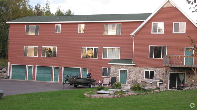 Garages for units 1,2 & 3  & front entry to unit #4 - 5185 Samuelson Rd