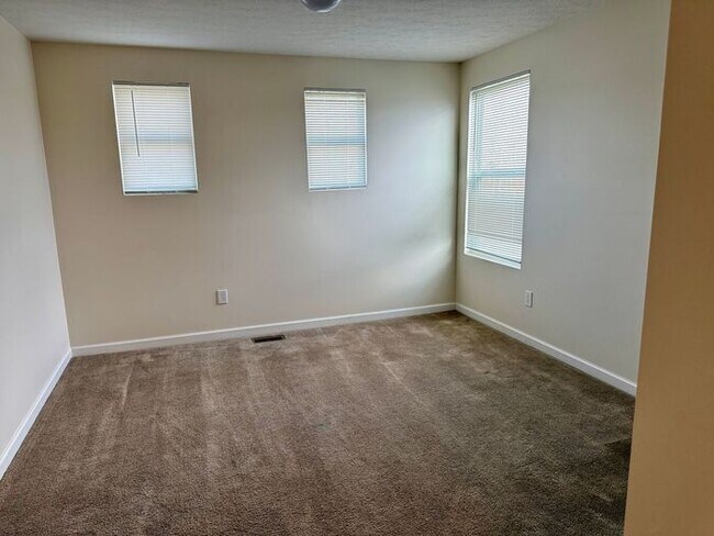 Building Photo - Spacious 4BR 2B w/ Large Backyard • Full Appliance Kitchen • 2-Car Garage in Pataskala