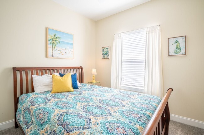 Building Photo - PRICE REDUCTION! LIVE AT THE BEACH FOR THE...