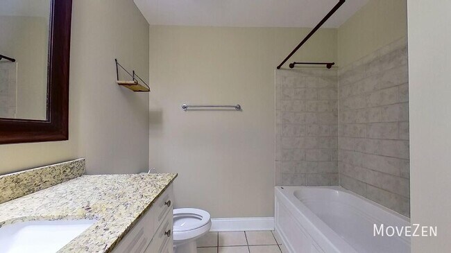 Building Photo - 300 W 5th St