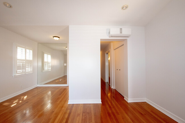 dining area with miror and hallway - 8940 Hubbard St