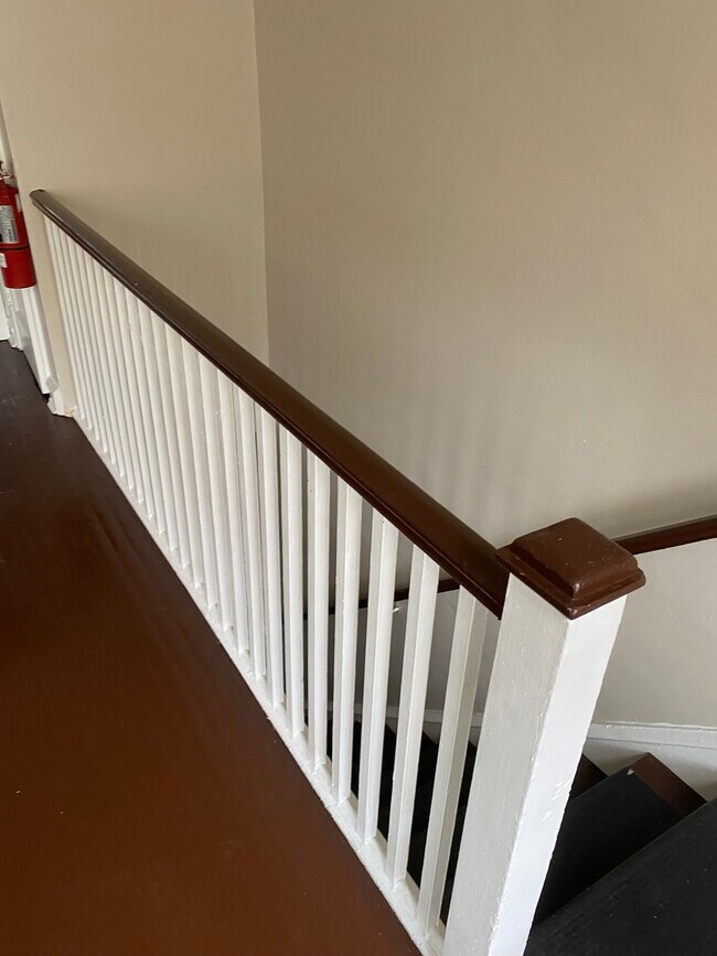 Stairway up into apartment - 114 E Main St