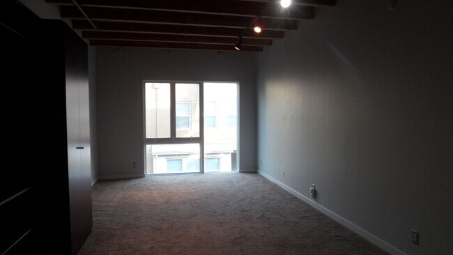 Building Photo - Office Space Living 2 BR 2.5 BA Attached 2 Car Garage