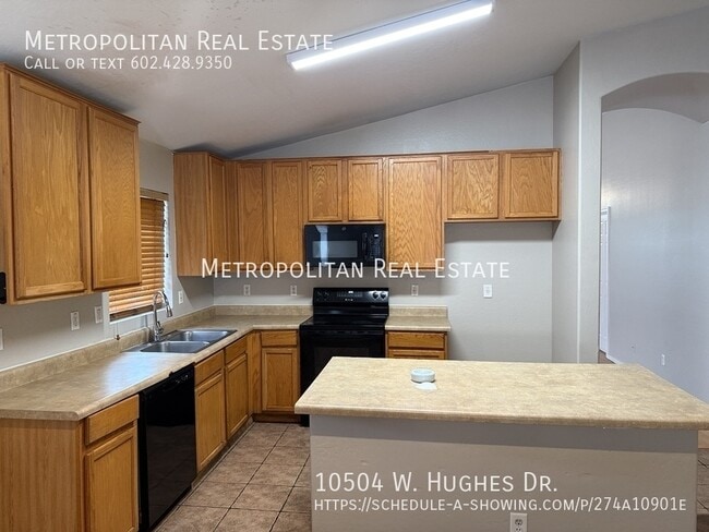 Building Photo - 10504 W Hughes Dr