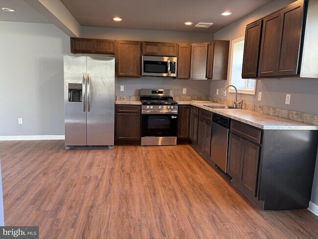 Building Photo - 5517 Schumacher Dr