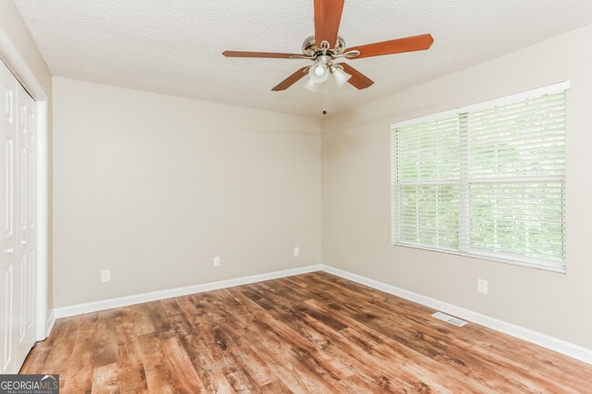 Building Photo - 7220 Woodcreek Way