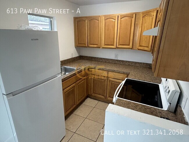 Building Photo - 613 Paw Paw St