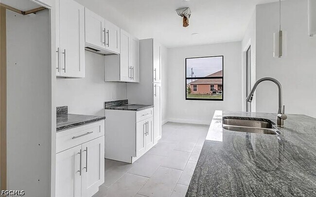 Building Photo - 408 Chiquita Blvd N