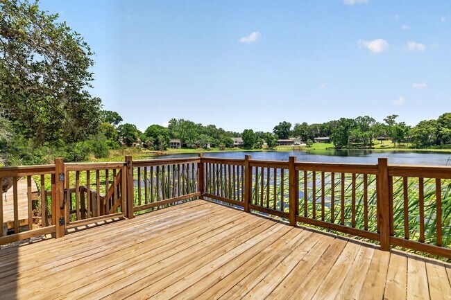 Building Photo - Available Now! Waterfront Living at Its Best – Pool, Decks & Gated Privacy