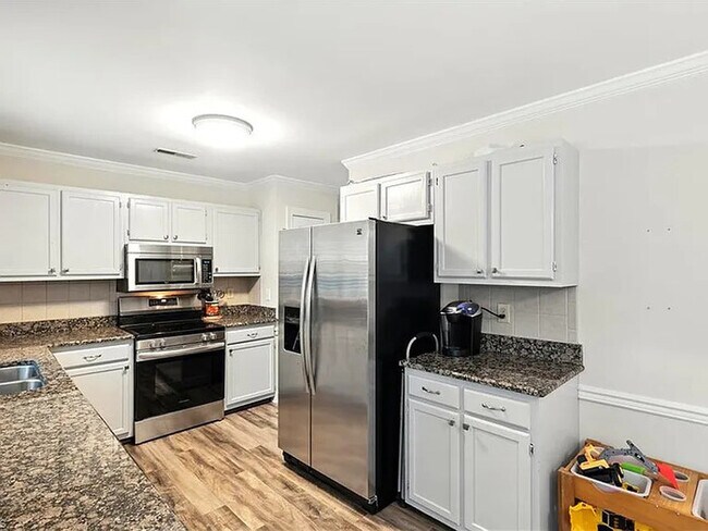 Building Photo - Earn Wealth While Leasing - Like a Homeown...