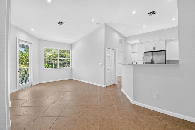 Building Photo - "Charming 2-Bed, 2-Bath Oasis in Riviera Beach – Your Perfect Retreat!"