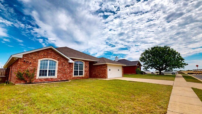 Building Photo - Charming 4-Bedroom Spacious Full-Brick Home with Modern Updates