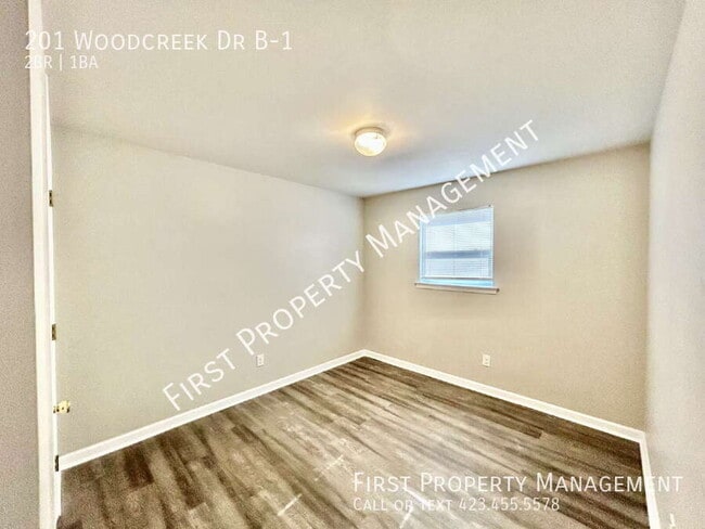 Building Photo - 201 Woodcreek Dr