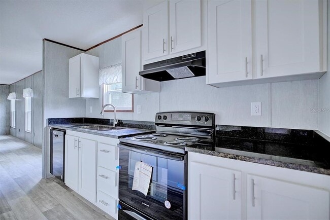 Building Photo - 8595 NW 13th Ct